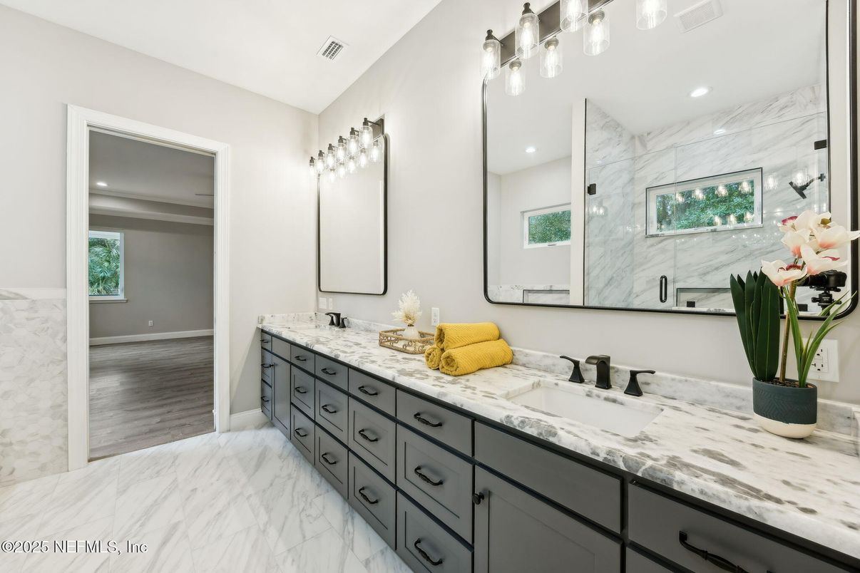 Bathroom, Dual Sink Vanities, Glass Shower, Interior, Marble, Marble Walls, Recessed Lighting