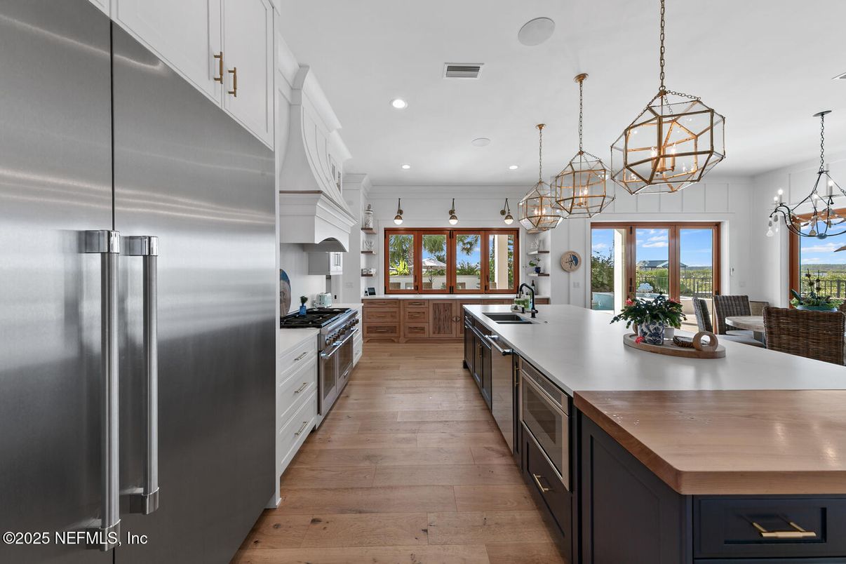 Chandelier, Interior, Kitchen, Pendant Lights, Recessed Lighting, Stainless Steel Appliances, Wood Texture Flooring