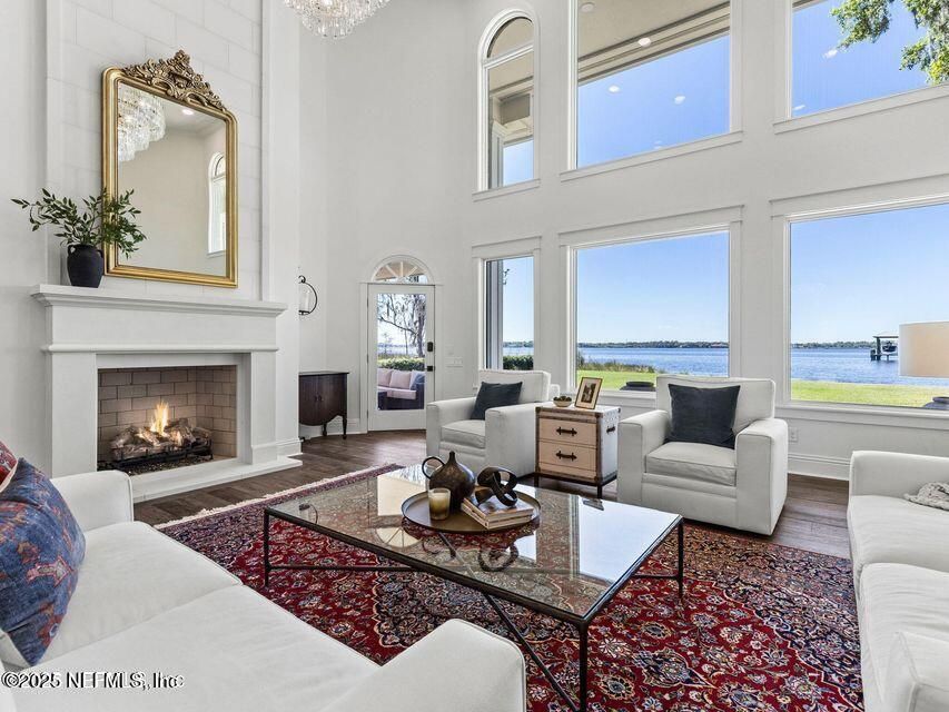 Chandelier, Fireplace, Interior, Living room, Water, Wood Texture Flooring