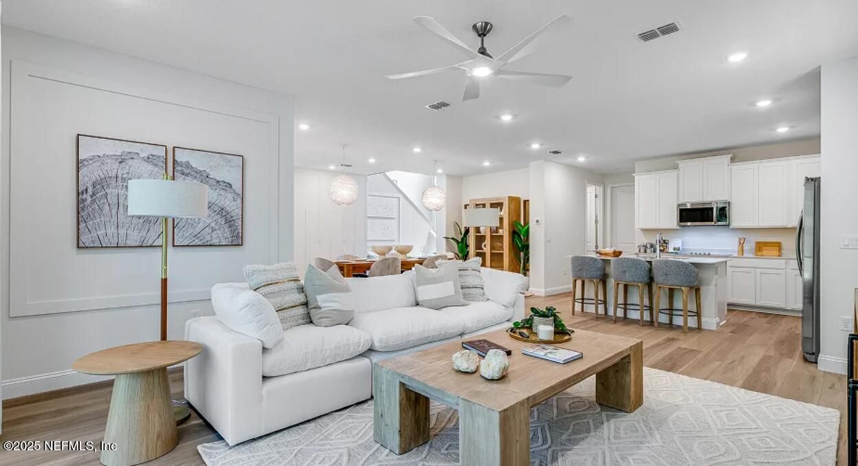 Dining room, Interior, Kitchen, Living room, Pendant Lights, Recessed Lighting, Stainless Steel Appliances, Wood Texture Flooring