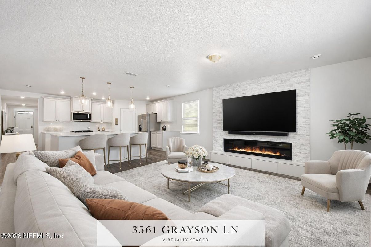 Fireplace, Interior, Kitchen, Living room, Pendant Lights, Recessed Lighting, Stainless Steel Appliances, Stone Walls