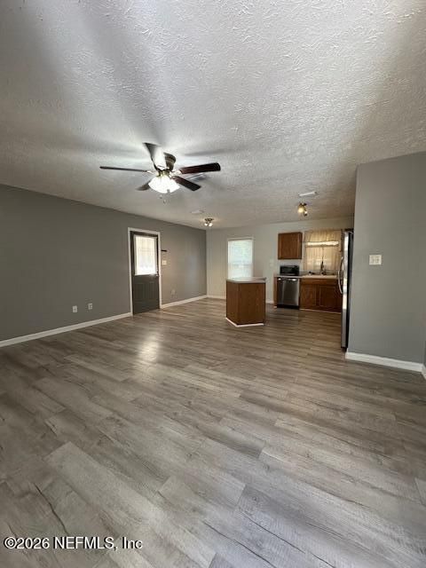 Empty room, Interior, Kitchen, Stainless Steel Appliances, Wood Texture Flooring