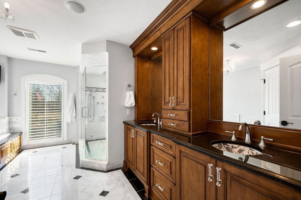 Bathroom, Chandelier, Dual Sink Vanities, Glass Shower, Interior, Marble, Recessed Lighting