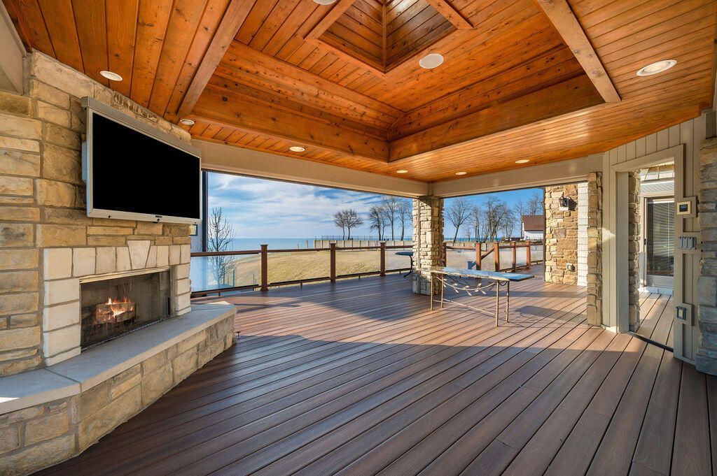 Exterior, Fireplace, Recessed Lighting, Water, Wooden Ceilings, Wood Texture Flooring