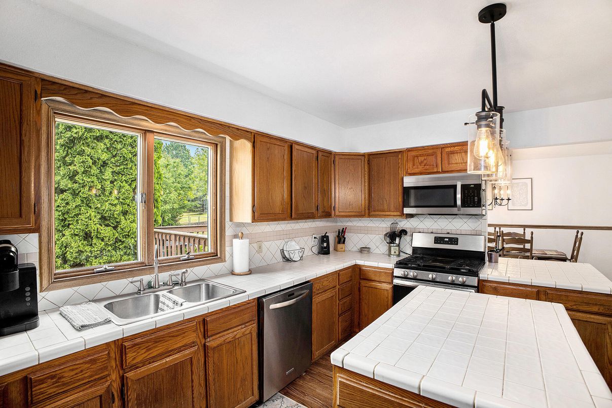 Interior, Kitchen, Pendant Lights, Stainless Steel Appliances, Tile Countertops