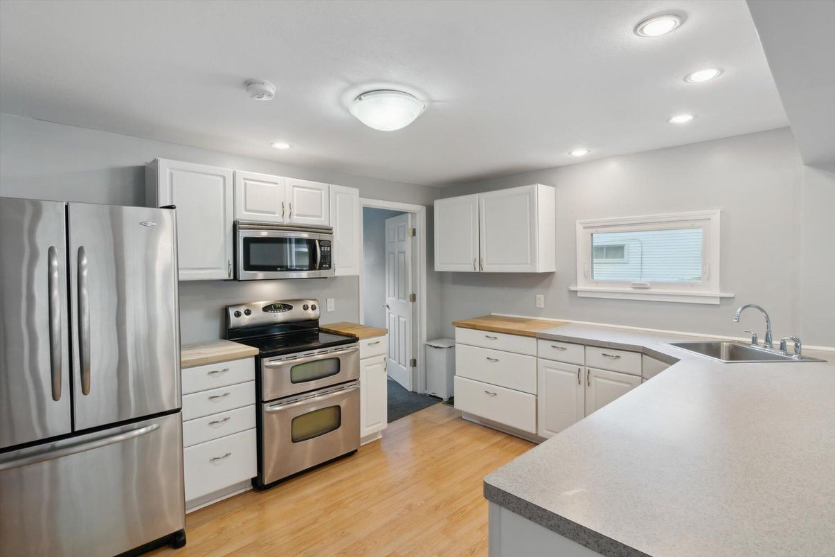 Interior, Kitchen, Recessed Lighting, Stainless Steel Appliances, Wood Texture Flooring