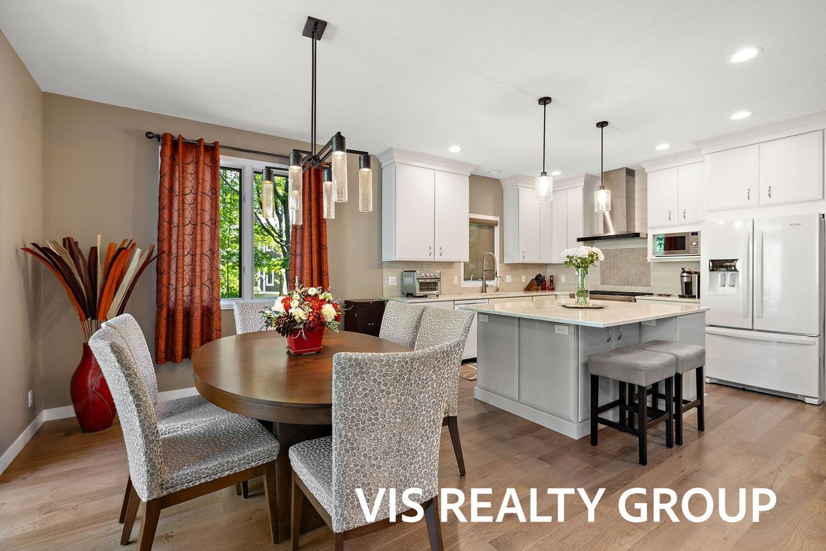 Dining room, Interior, Kitchen, Pendant Lights, Recessed Lighting, Stainless Steel Appliances, Wood Texture Flooring