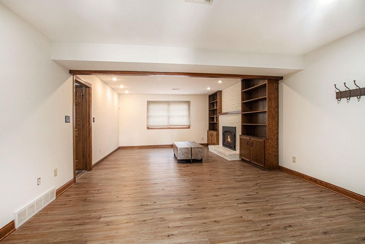 Empty room, Fireplace, Interior, Recessed Lighting, Wood Texture Flooring