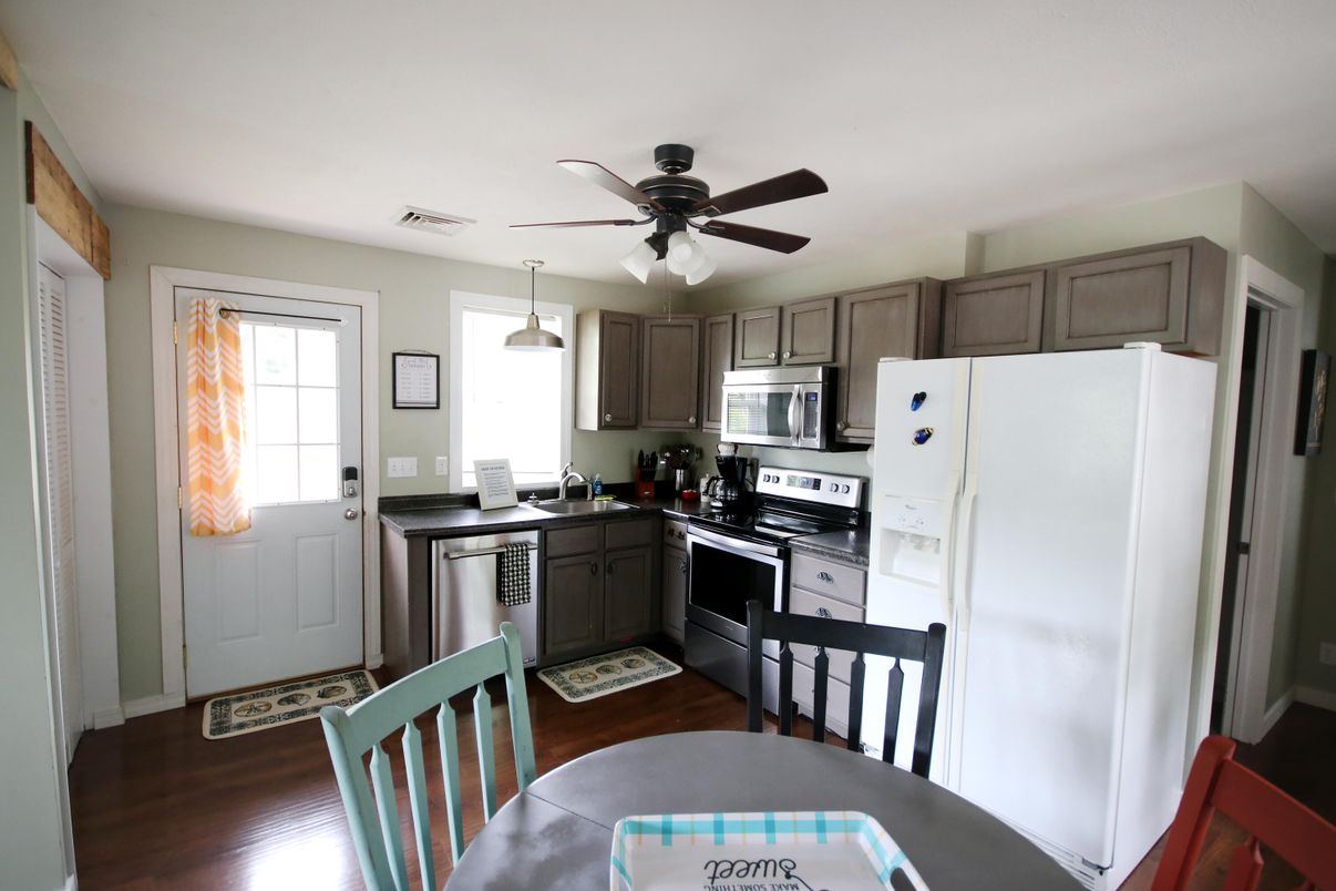Dining room, Interior, Kitchen, Pendant Lights, Stainless Steel Appliances, Wood Texture Flooring