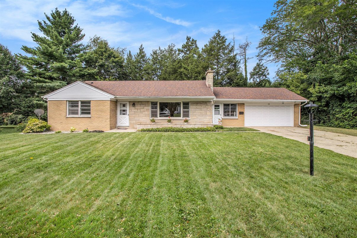 Attached, Backyard, Exterior, Facade, Brick Facade, Ranch