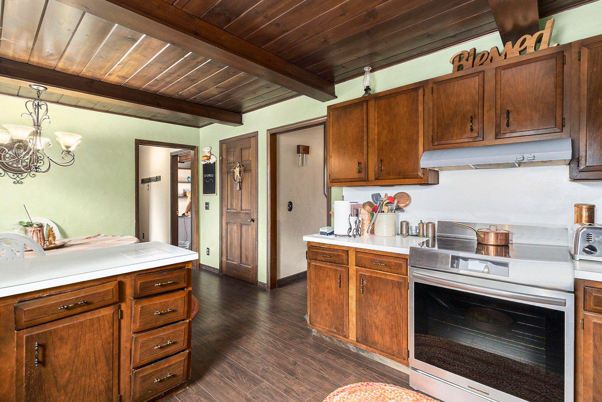 Chandelier, Interior, Kitchen, Stainless Steel Appliances, Tile Countertops, Wooden Beams, Wooden Ceilings, Wood Texture Flooring
