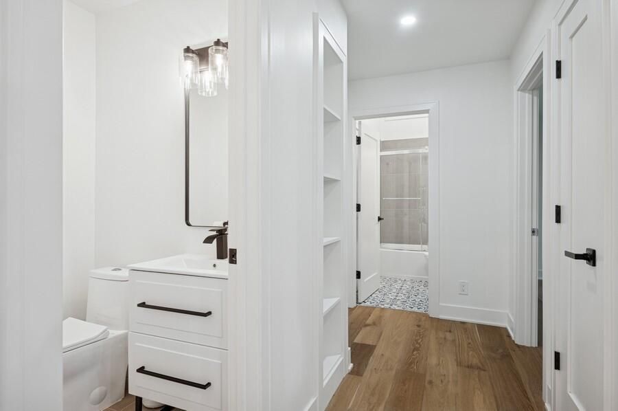 Bathroom, Glass Shower, Interior, Recessed Lighting, Wood Texture Flooring