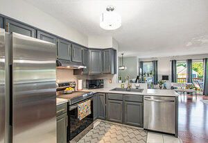 Dining room, Interior, Kitchen, Pendant Lights, Stainless Steel Appliances, Wood Texture Flooring