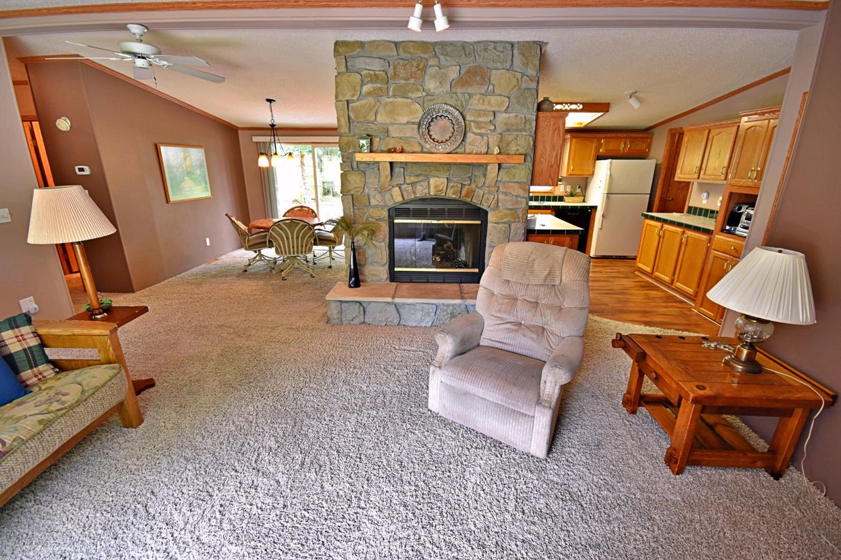 Dining room, Fireplace, Interior, Kitchen, Pendant Lights, Stone Walls, Wood Texture Flooring