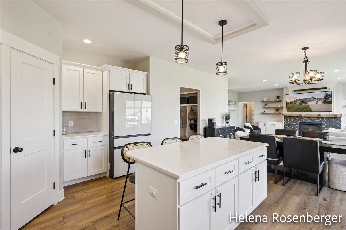 Chandelier, Dining room, Fireplace, Interior, Kitchen, Pendant Lights, Recessed Lighting, Wood Texture Flooring