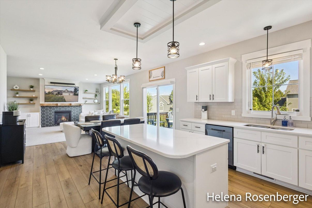 Chandelier, Dining room, Fireplace, Interior, Kitchen, Living room, Pendant Lights, Recessed Lighting, Wood Texture Flooring