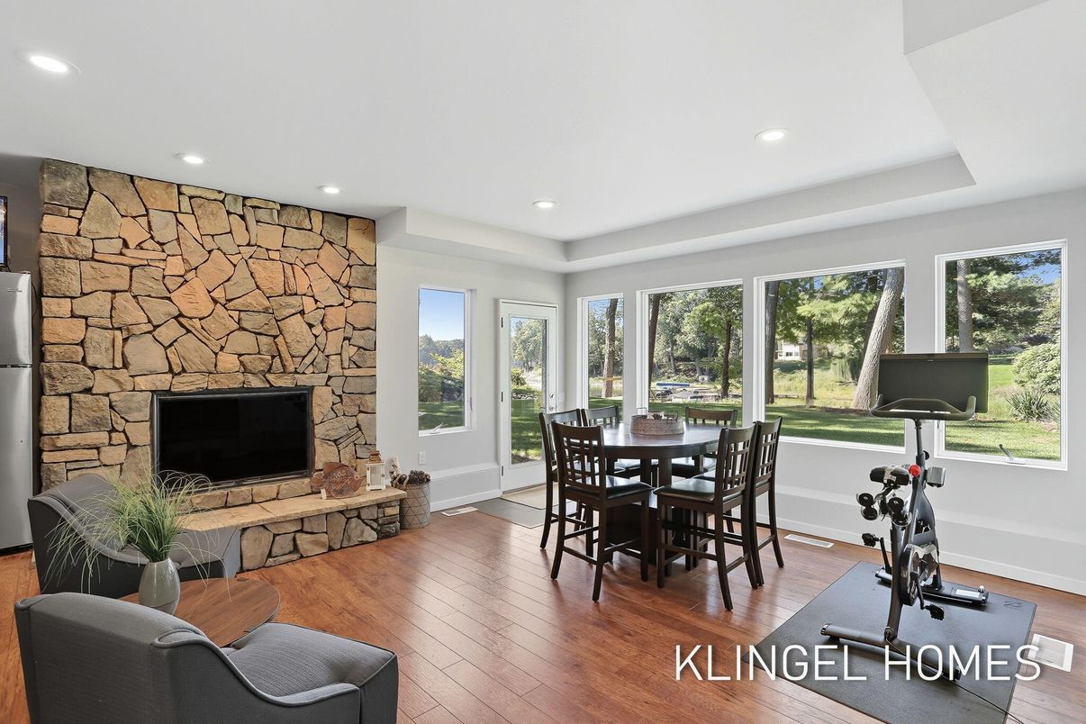 Dining room, Fitness Equipment, Interior, Recessed Lighting, Stone Walls, Wood Texture Flooring