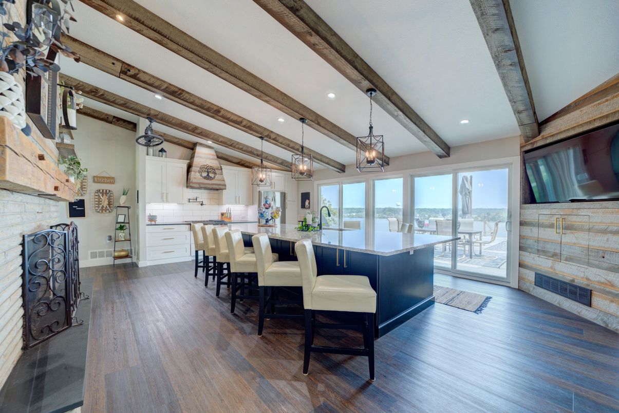 Dining room, Fireplace, Interior, Kitchen, Pendant Lights, Recessed Lighting, Stone Walls, Wooden Beams, Wood Texture Flooring