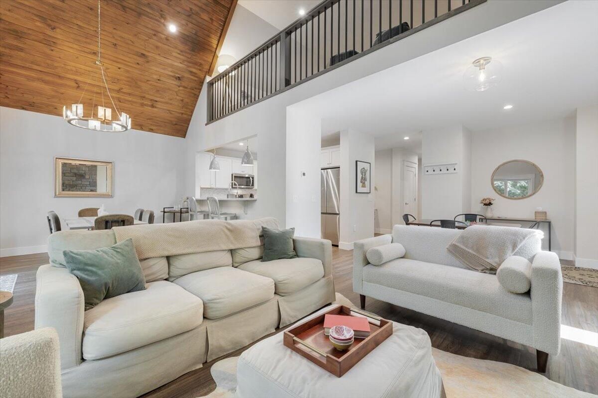 Chandelier, Dining room, Interior, Living room, Pendant Lights, Recessed Lighting, Wooden Ceilings, Wood Texture Flooring