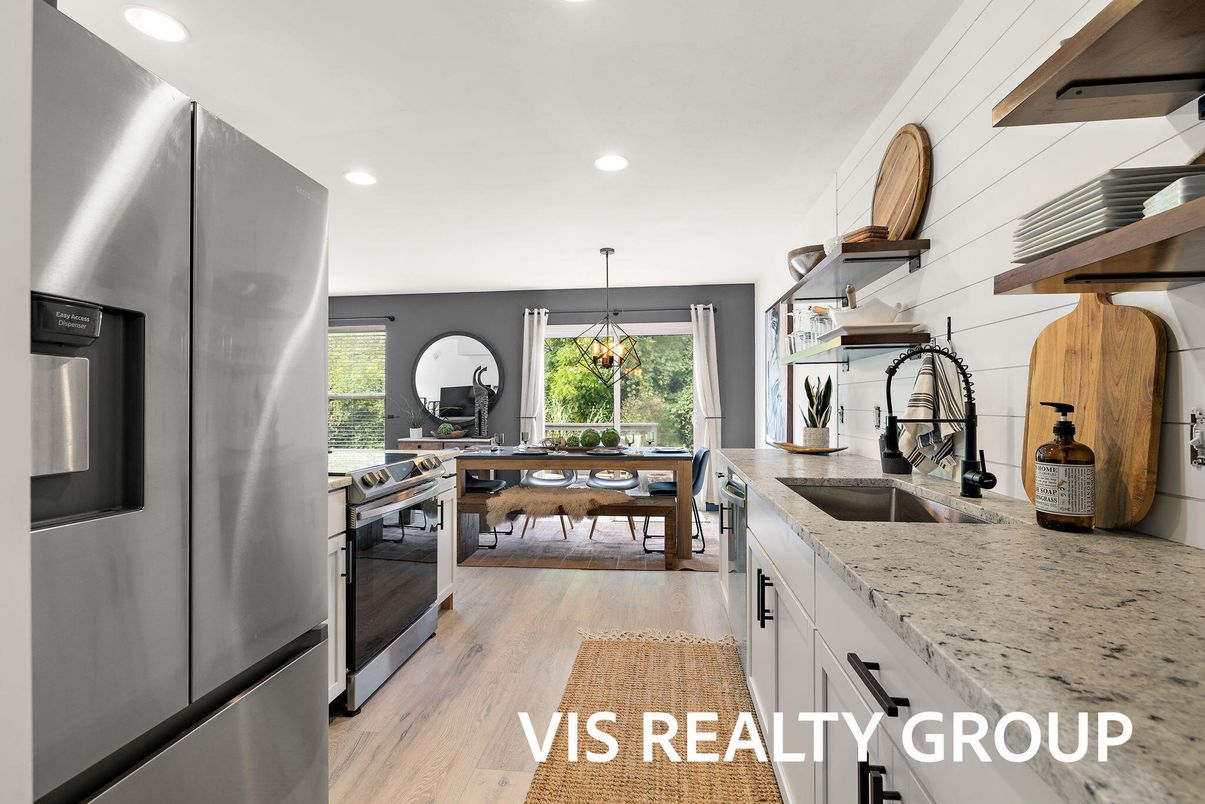 Dining room, Interior, Kitchen, Pendant Lights, Recessed Lighting, Stainless Steel Appliances, Wood Texture Flooring