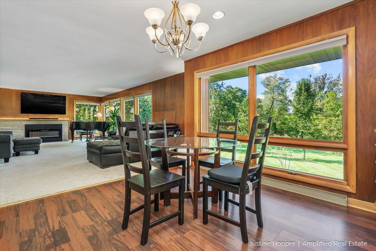 Chandelier, Dining room, Fireplace, Interior, Living room, Recessed Lighting, Wood Texture Flooring, Wooden Walls