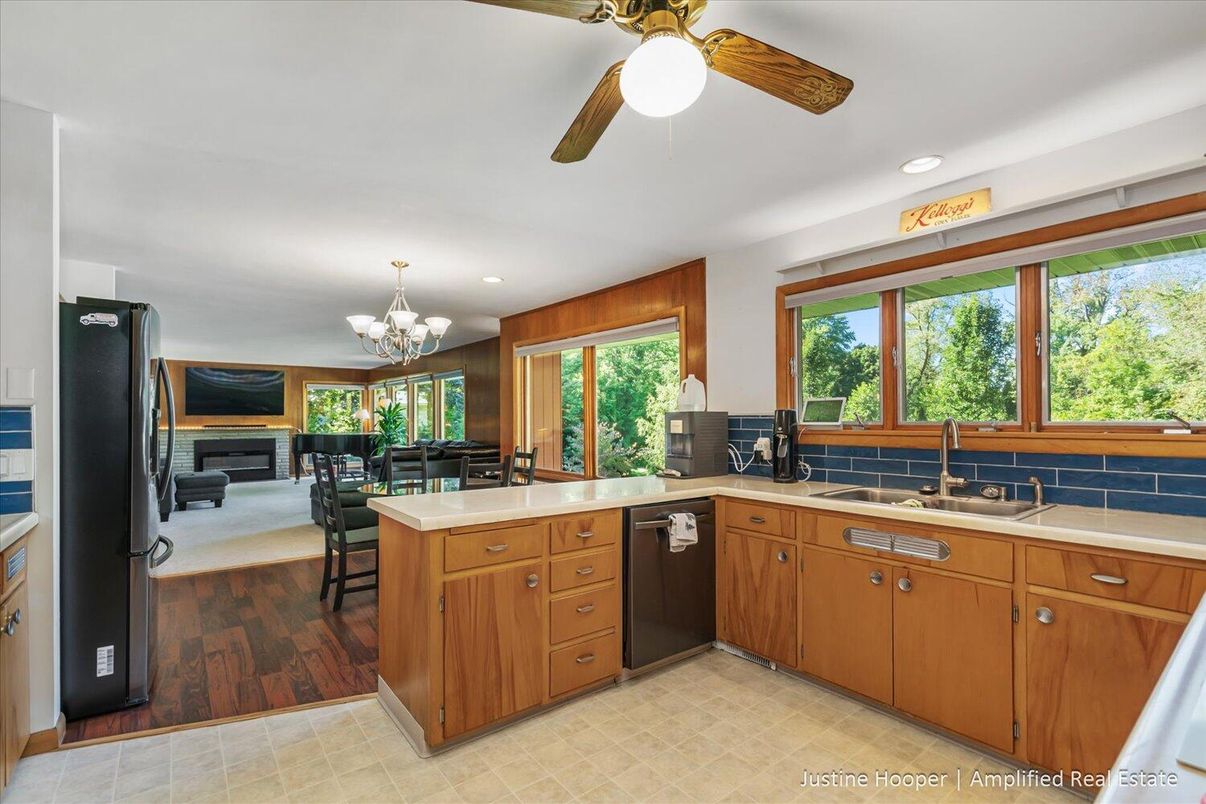 Chandelier, Dining room, Fireplace, Interior, Kitchen, Recessed Lighting, Wood Texture Flooring