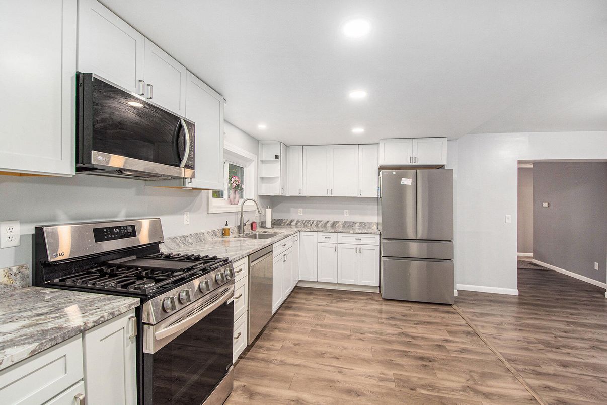 Interior, Kitchen, Recessed Lighting, Stainless Steel Appliances, Wood Texture Flooring