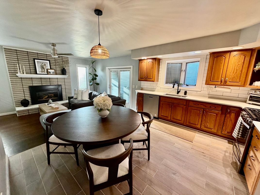 Dining room, Fireplace, Interior, Kitchen, Pendant Lights, Stone Walls, Wood Texture Flooring