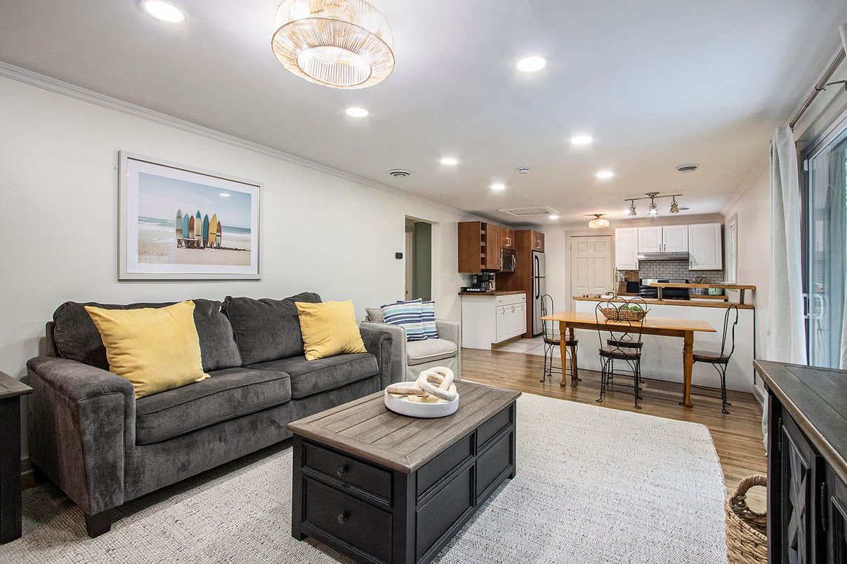 Dining room, Interior, Kitchen, Living room, Pendant Lights, Recessed Lighting, Stainless Steel Appliances, Wood Texture Flooring