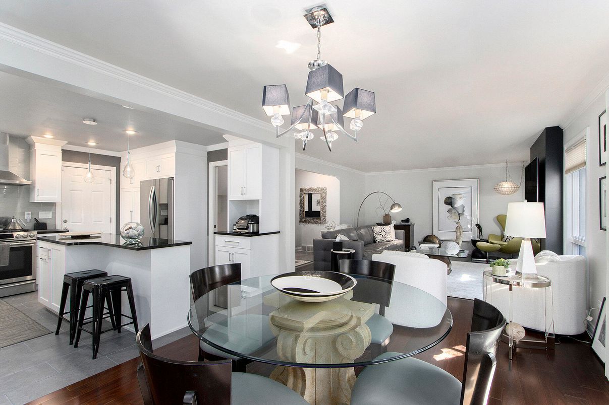 Chandelier, Dining room, Interior, Kitchen, Living room, Pendant Lights, Recessed Lighting, Stainless Steel Appliances, Wood Texture Flooring