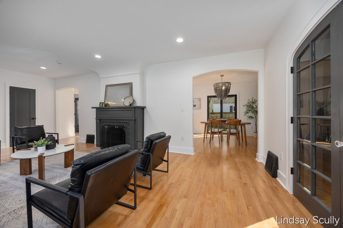 Dining room, Fireplace, Interior, Living room, Pendant Lights, Recessed Lighting, Wood Texture Flooring