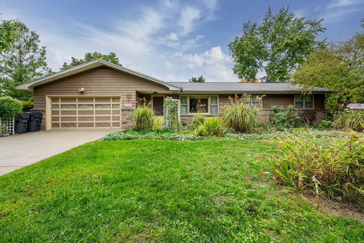 Attached, Backyard, Exterior, Facade, Brick Facade, Ranch