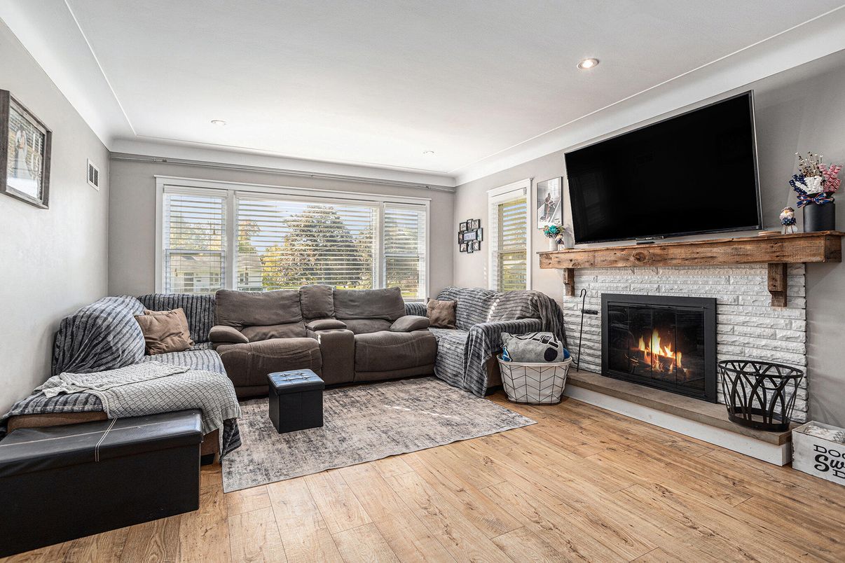 Fireplace, Interior, Living room, Recessed Lighting, Wood Texture Flooring