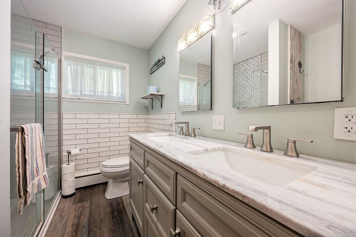 Bathroom, Dual Sink Vanities, Glass Shower, Interior, Wood Texture Flooring