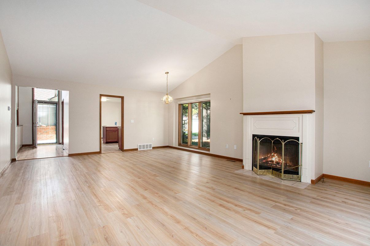 Empty room, Fireplace, Interior, Pendant Lights, Wood Texture Flooring