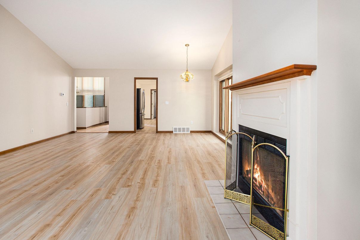 Empty room, Fireplace, Interior, Pendant Lights, Wood Texture Flooring