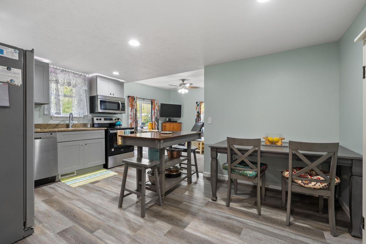Dining room, Interior, Kitchen, Recessed Lighting, Stainless Steel Appliances, Wood Texture Flooring