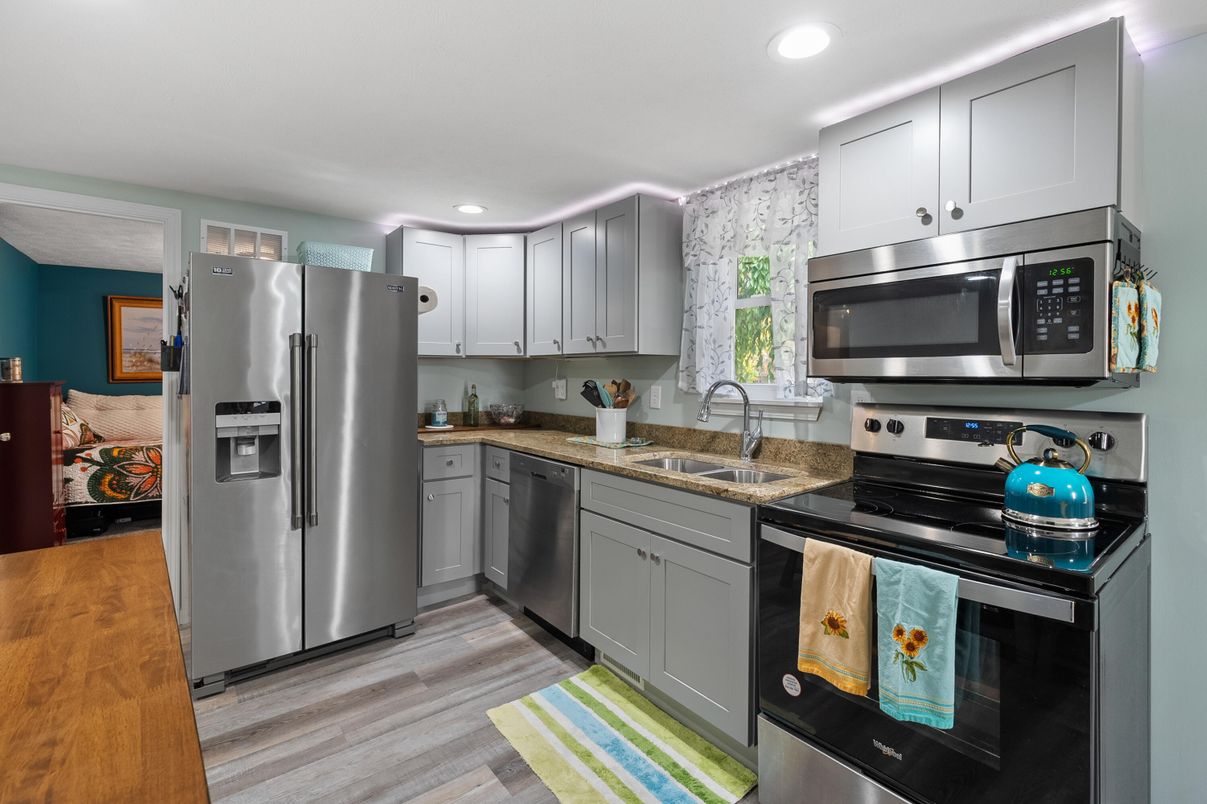 Interior, Kitchen, Recessed Lighting, Stainless Steel Appliances, Wood Texture Flooring