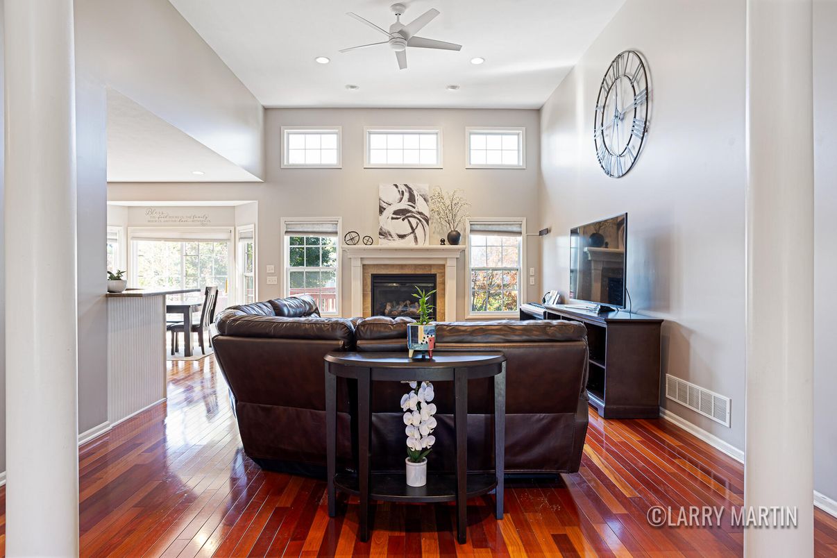 Dining room, Fireplace, Interior, Living room, Recessed Lighting, Wood Texture Flooring