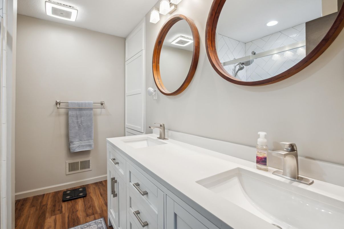 Bathroom, Dual Sink Vanities, Interior, Recessed Lighting, Wood Texture Flooring
