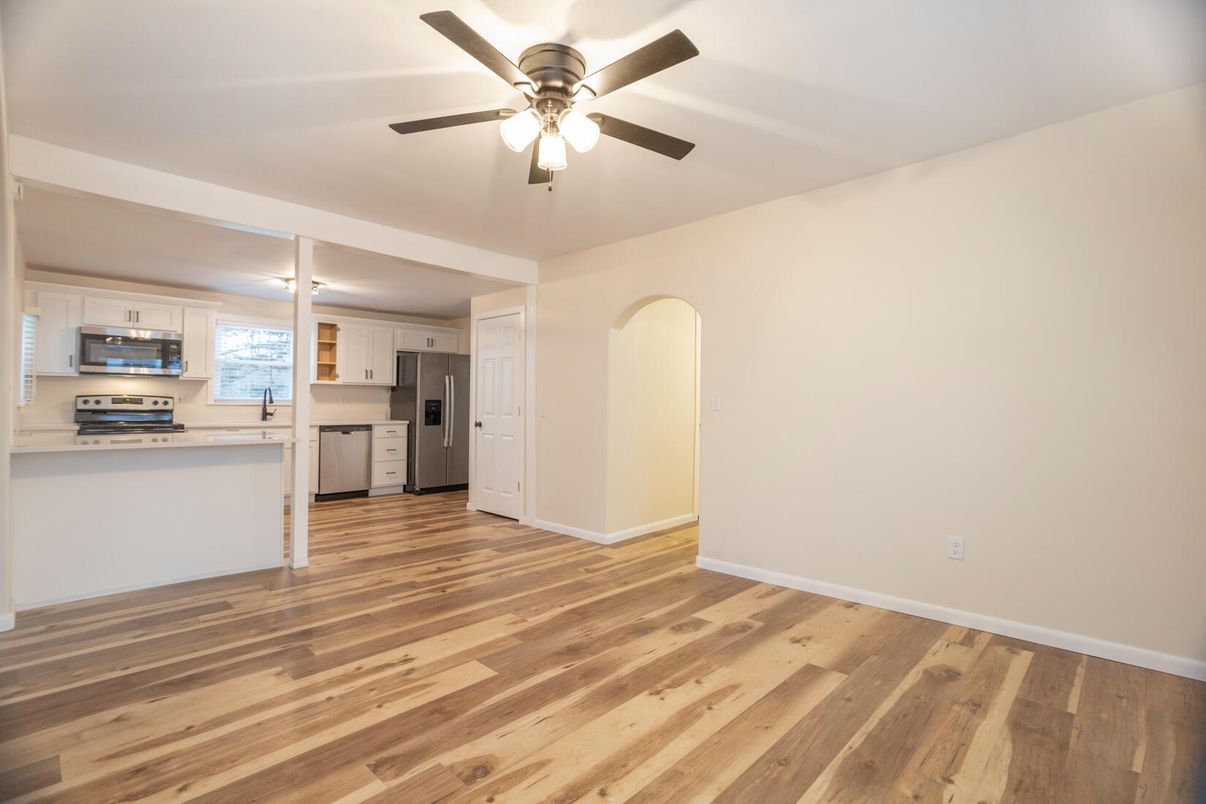 Empty room, Interior, Kitchen, Stainless Steel Appliances, Wood Texture Flooring