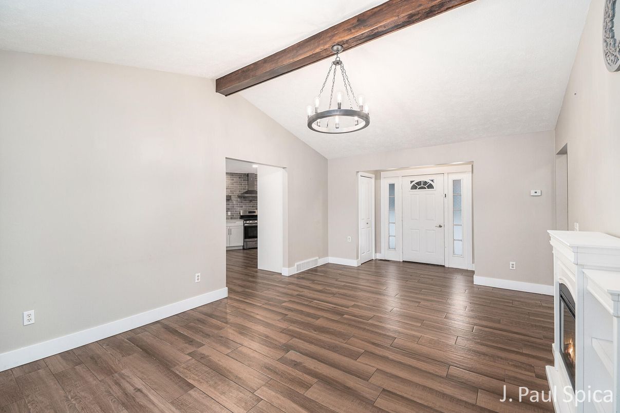 Chandelier, Empty room, Fireplace, Interior, Pendant Lights, Wooden Beams, Wood Texture Flooring