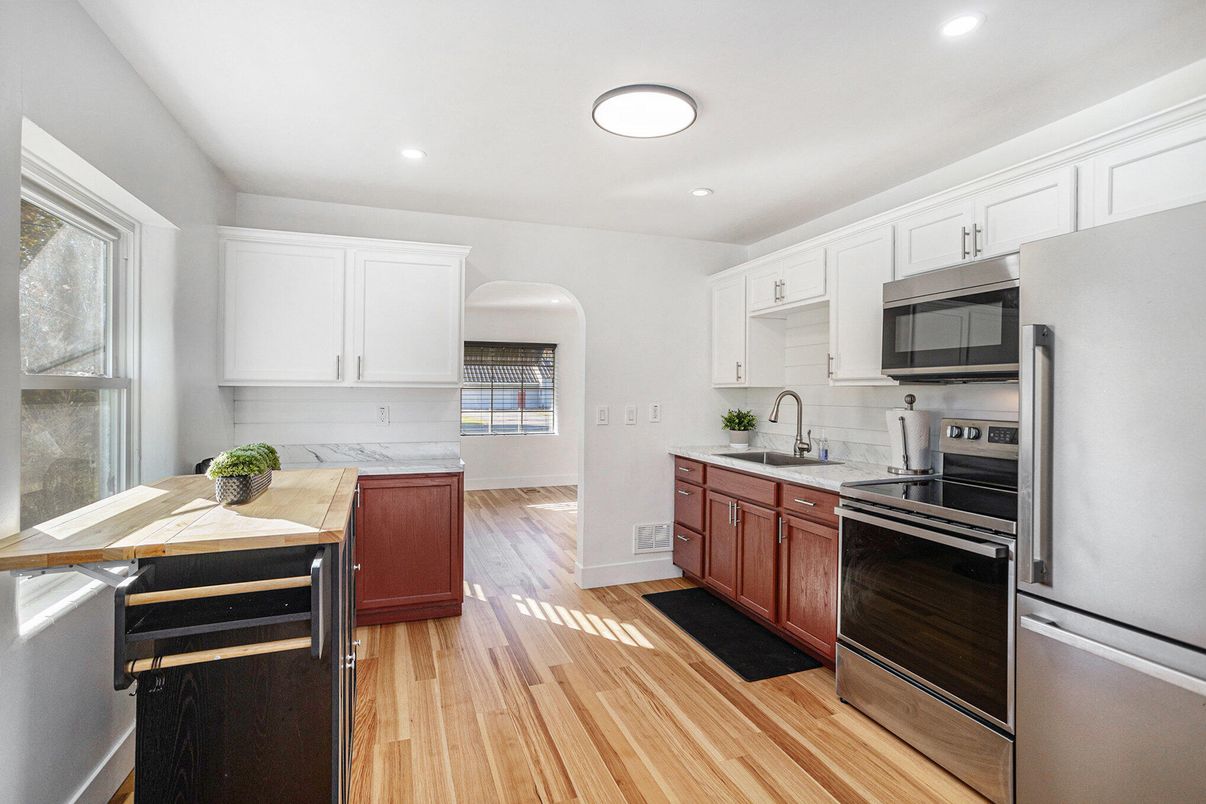 Interior, Kitchen, Recessed Lighting, Stainless Steel Appliances, Wood Texture Flooring