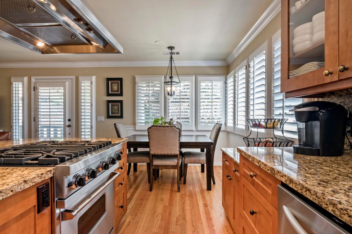 Dining room, Interior, Kitchen, Pendant Lights, Stainless Steel Appliances, Wood Texture Flooring