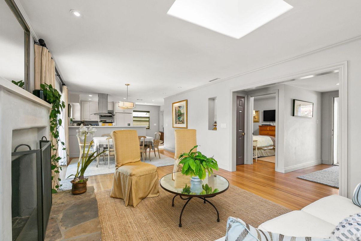 Dining room, Fireplace, Interior, Kitchen, Living room, Pendant Lights, Recessed Lighting, Stainless Steel Appliances, Wood Texture Flooring