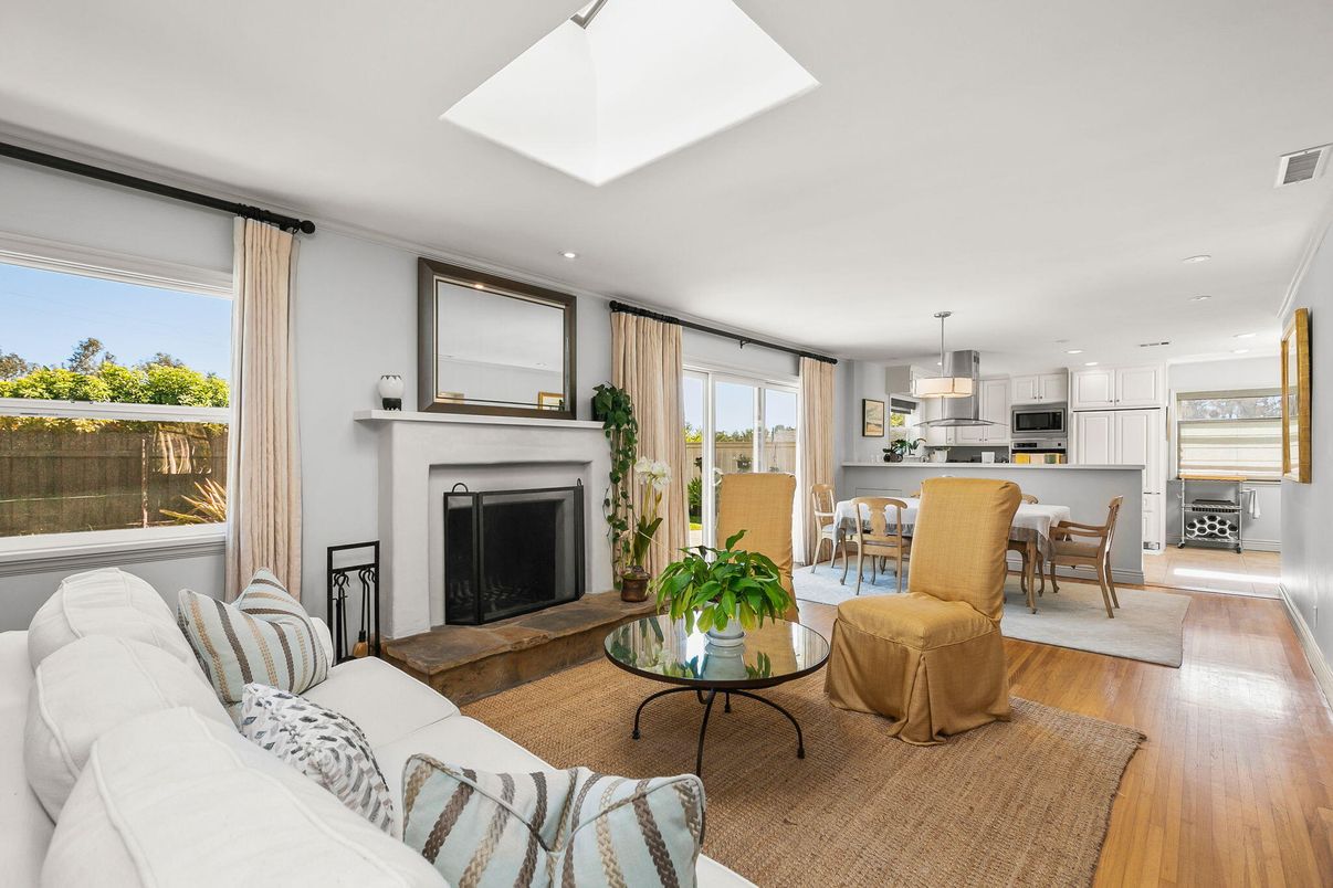 Dining room, Fireplace, Interior, Kitchen, Living room, Pendant Lights, Recessed Lighting, Stainless Steel Appliances, Wood Texture Flooring