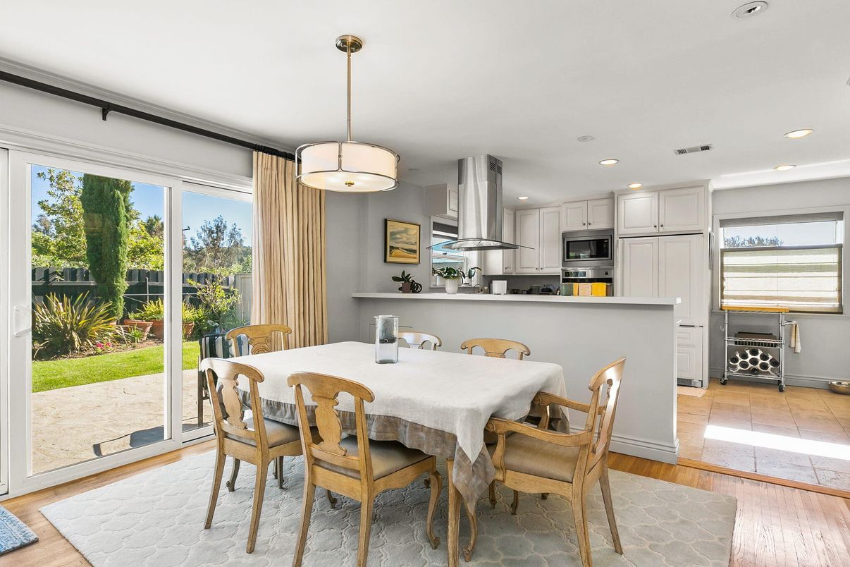 Dining room, Interior, Kitchen, Pendant Lights, Recessed Lighting, Stainless Steel Appliances, Wood Texture Flooring