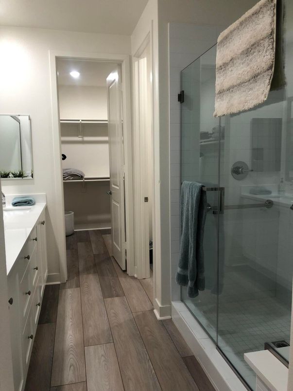 Bathroom, Glass Shower, Interior, Recessed Lighting, Walk-in Closets, Wood Texture Flooring