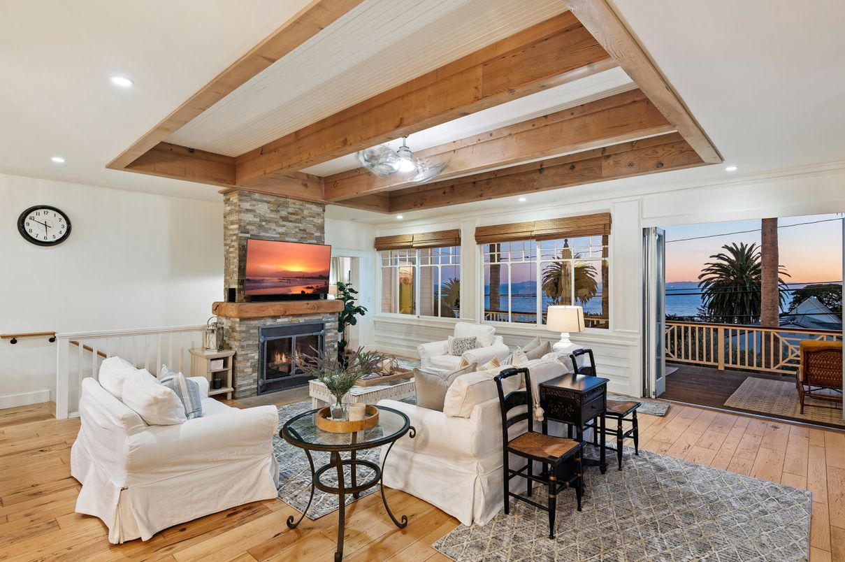 Fireplace, Interior, Living room, Recessed Lighting, Stone Walls, Water, Wooden Beams, Wood Texture Flooring