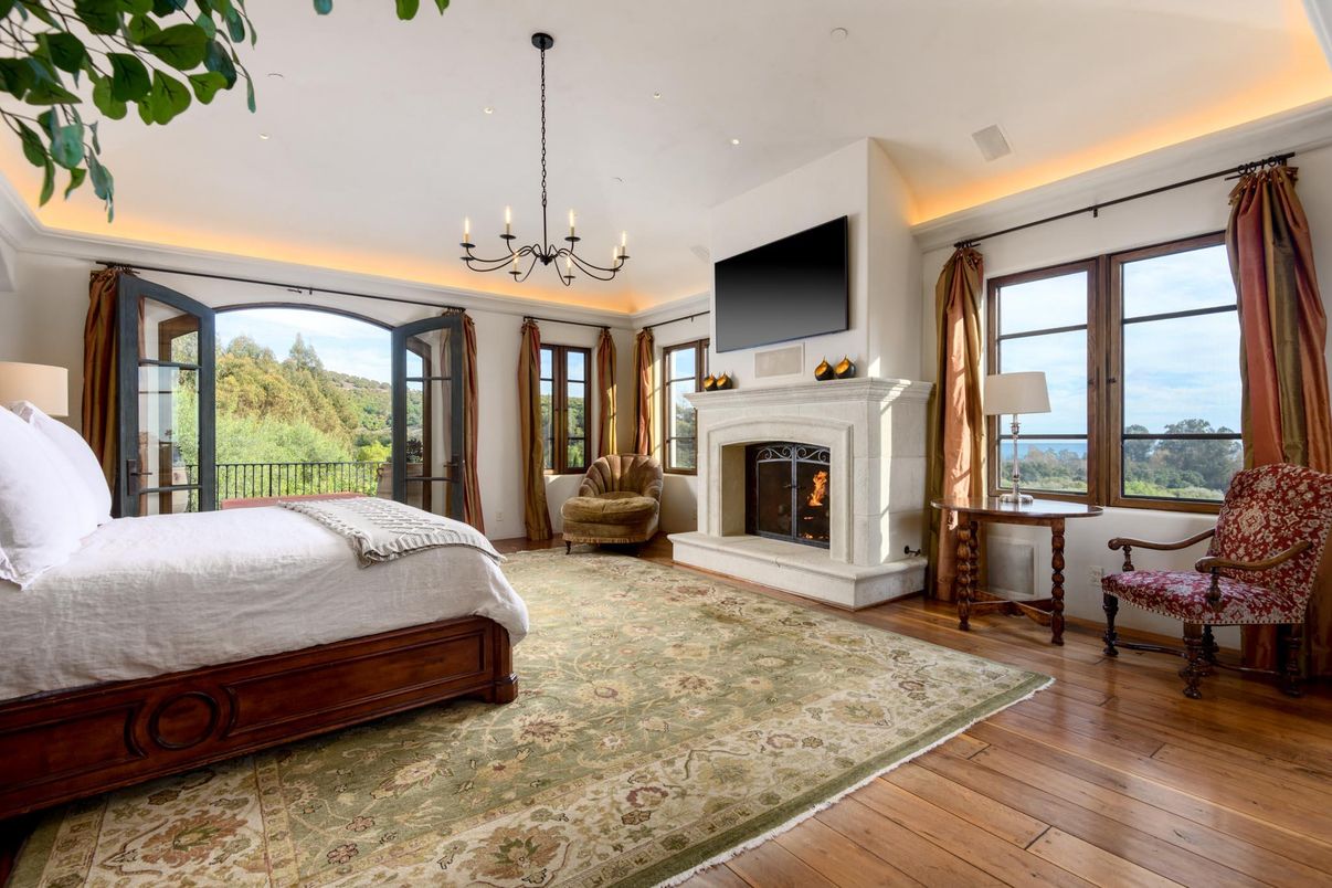 Bedroom, Chandelier, Fireplace, Interior, Recessed Lighting, Wood Texture Flooring